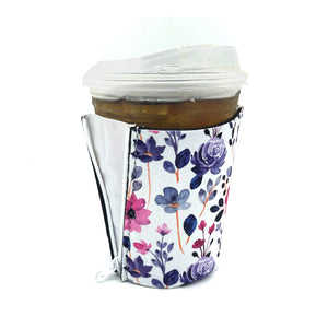 Purple Floral ZipSip drink sleeve on red solo cup